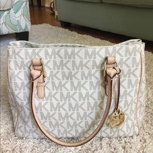 Gently used Michael Kors Jet Set Work Tote Bag .